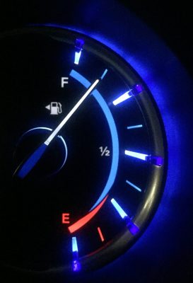 fuel gauge showing 7/8th of a tank of gas